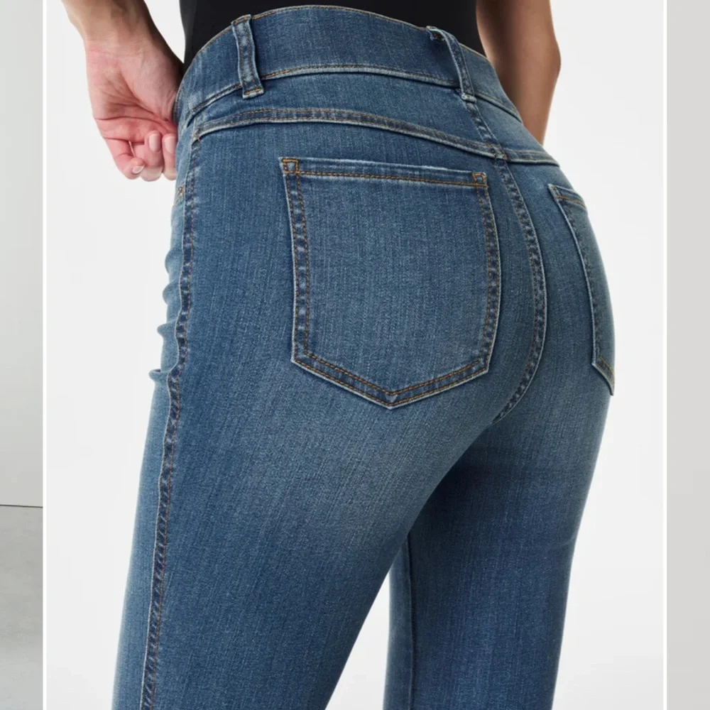 SPANX Classic Blue Flare Jeans. Never worn, I’m 5’10”, reg length was good. - Picture 3 of 3